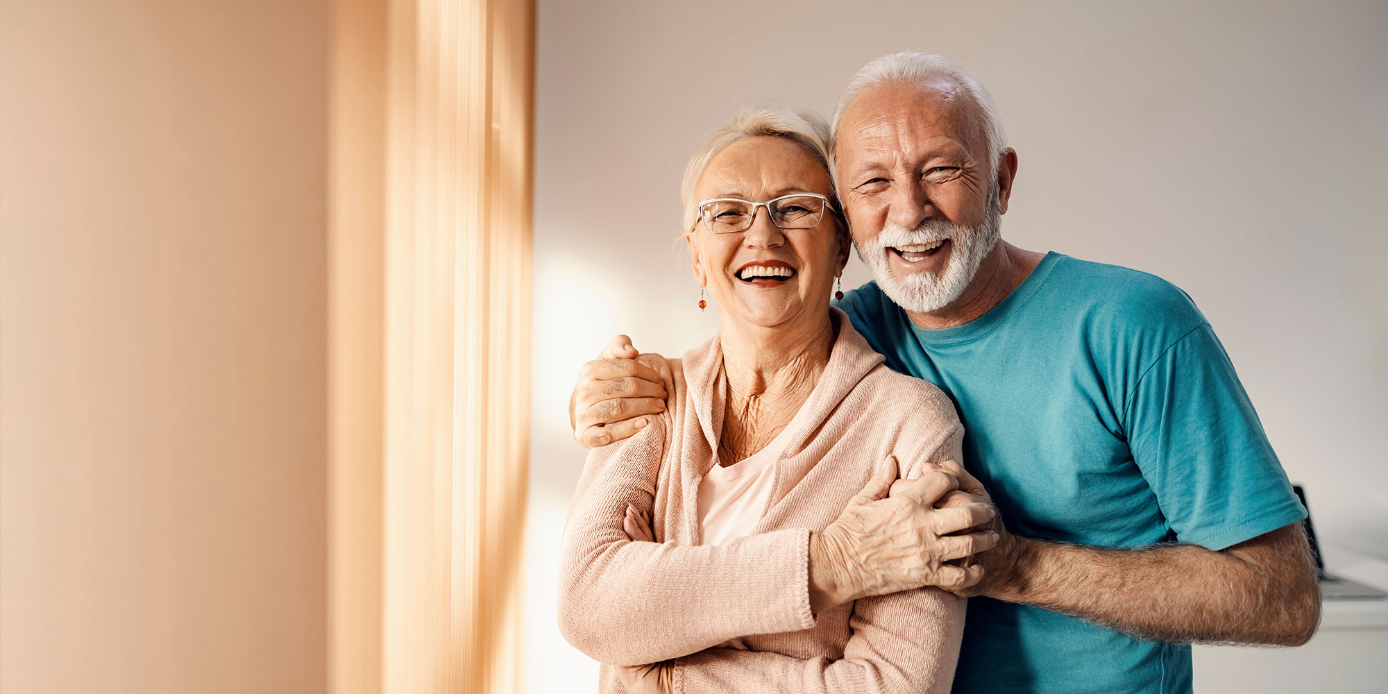 couple showing off dentures